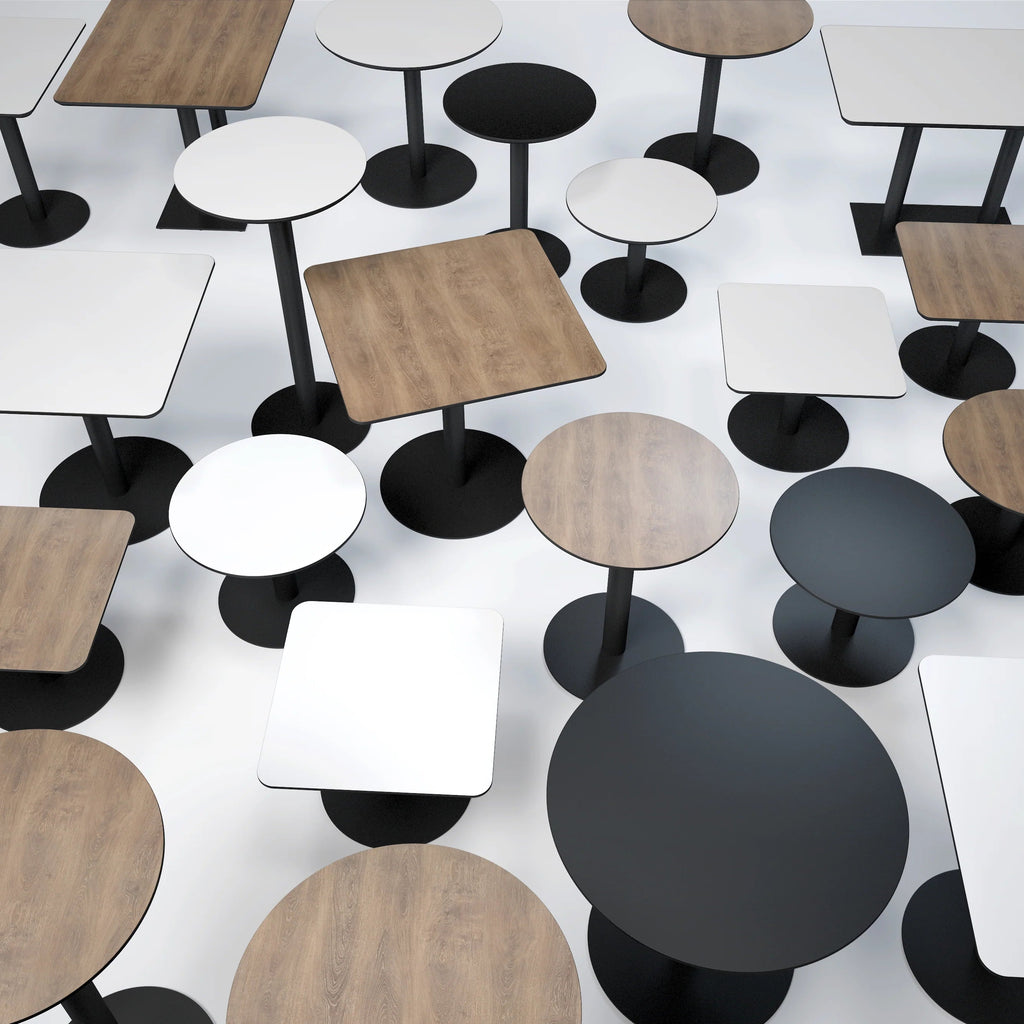 Pattern of variously sized tables with different surface finishes on a white background